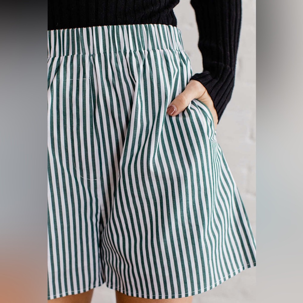 All: Row size small green and white striped short like new